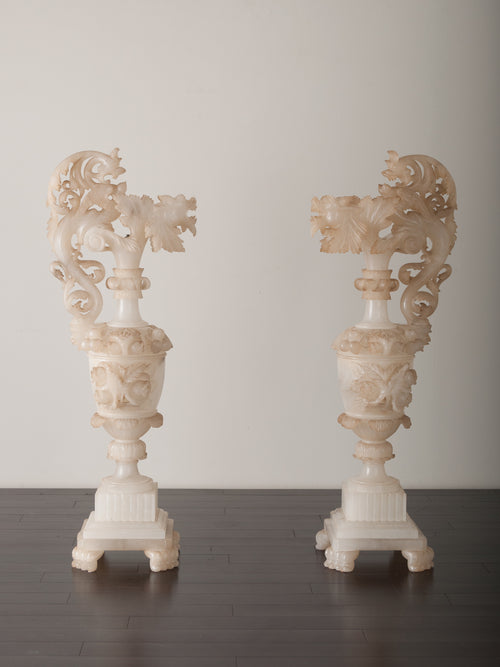 PAIR OF WHIMSICAL CARVED URNS